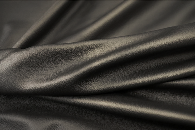 Close up of rich black pigmented upholstery leather