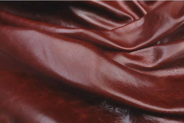 Close-up picture of Bordeaux Distress leather for upholstery with waxy finish
