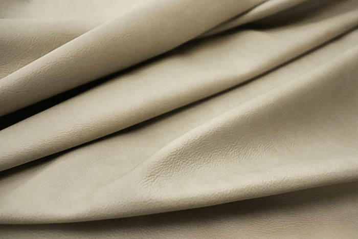 Closeup picture of Cotton Club soft, pearl grey colored upholstery leather for furniture
