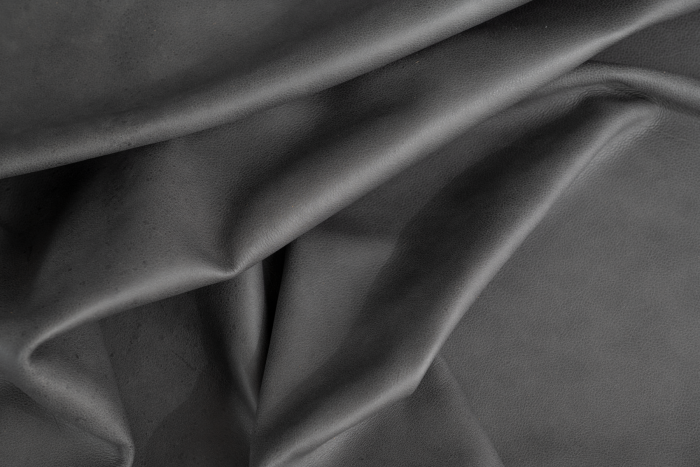 Close up of smokey grey natural grain upholstery leather
