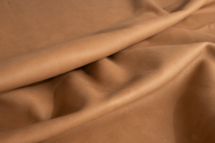 Close up of golden tan full grain upholstery leather