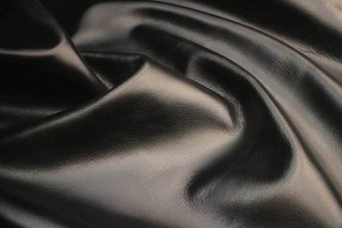 Picture showing the characteristics of a black pull up leather hide