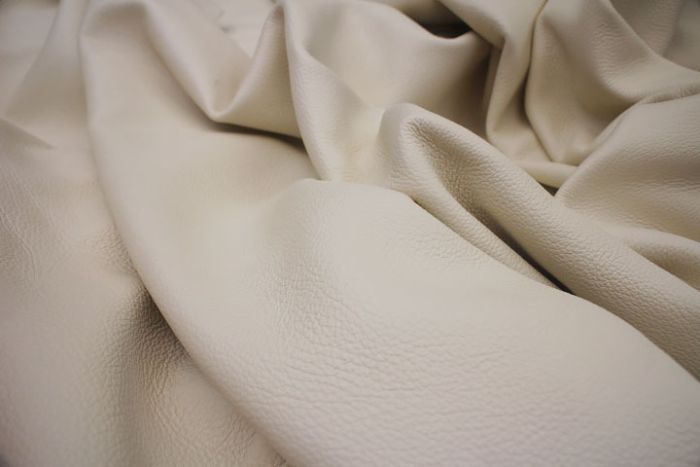Picture showing the characteristics of a cream full grain leather hide