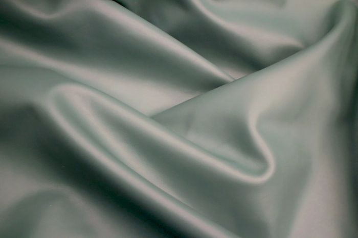 Picture showing the characteristics of a teal Italian leather hide