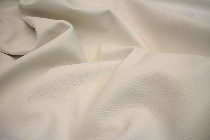 Close up picture of eggshell pigmented leather for upholstery 