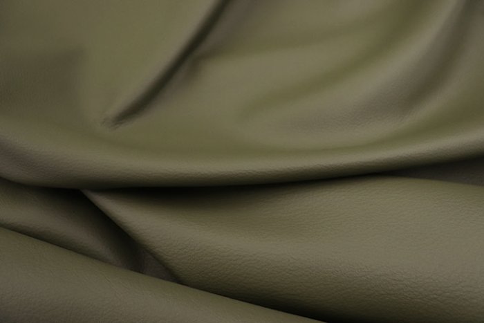 Close up of moss green pigmented upholstery leather