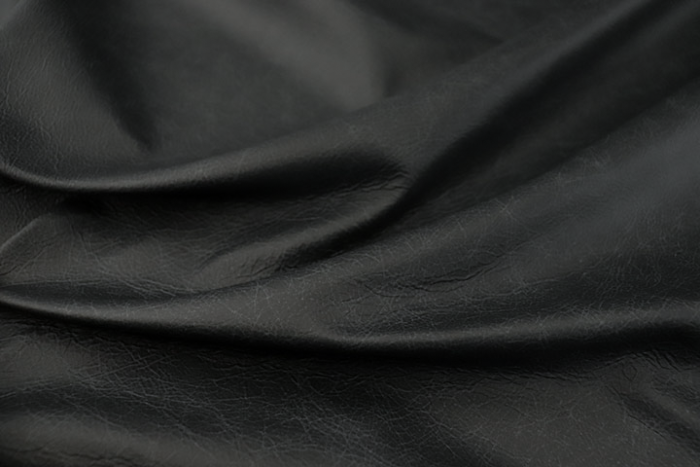 Close up of multitone slate grey pigmented upholstery leather