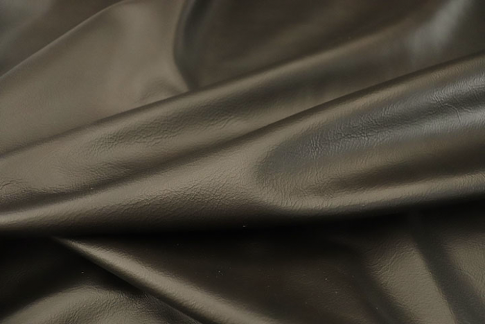 Close up of multitone coffee brown full grain upholstery leather