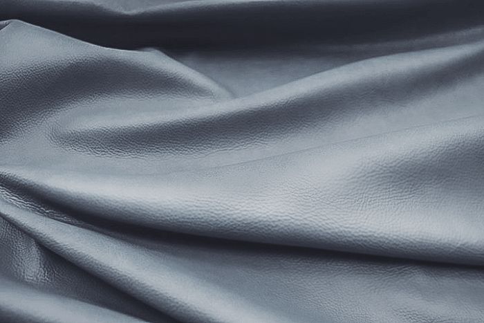 Closeup picture of Rhapsody soft, light blue colored upholstery leather for furniture