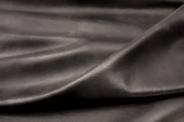 Closeup picture of Midnight Train soft, dark grey colored upholstery leather for furniture