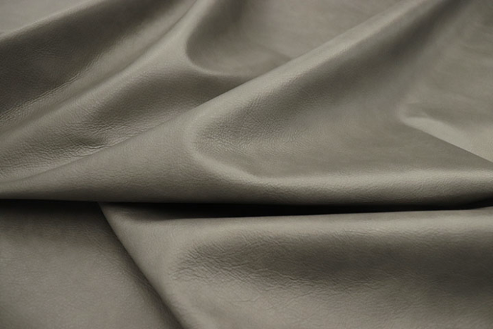 Close up of multi-tone grey natural grain upholstery leather