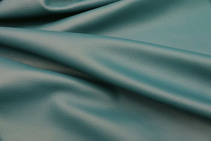 Picture showing the characteristics of a teal full grain leather hide