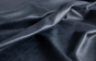 Close up of navy blue aniline dyed upholstery leather