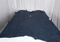Picture of navy blue distressed upholstery leather displayed on a table