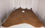 Picture of rich brown multitone top grain upholstery leather displayed on a table