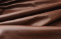 Picture of draping Swing Time, dark brandy colored genuine cowhide leather for upholstery
